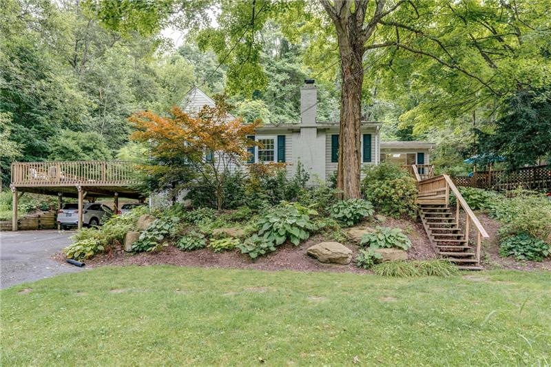 Welcome home to this adorable ranch bungalow surro