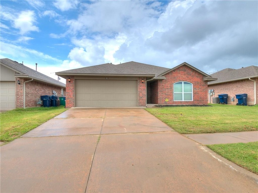 Garage entrance and driveway are spacious and invi