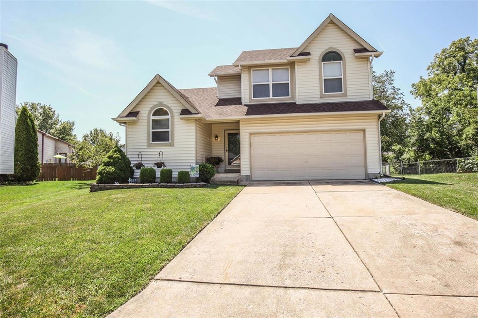 A wonderful 1.5 story home on a level and fenced c