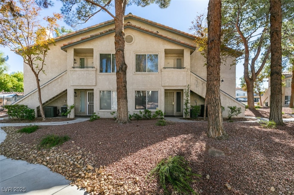 View of building exterior featuring stairs