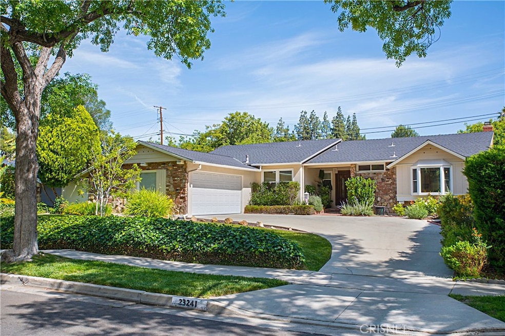Prime location, inviting curb appeal with mature trees