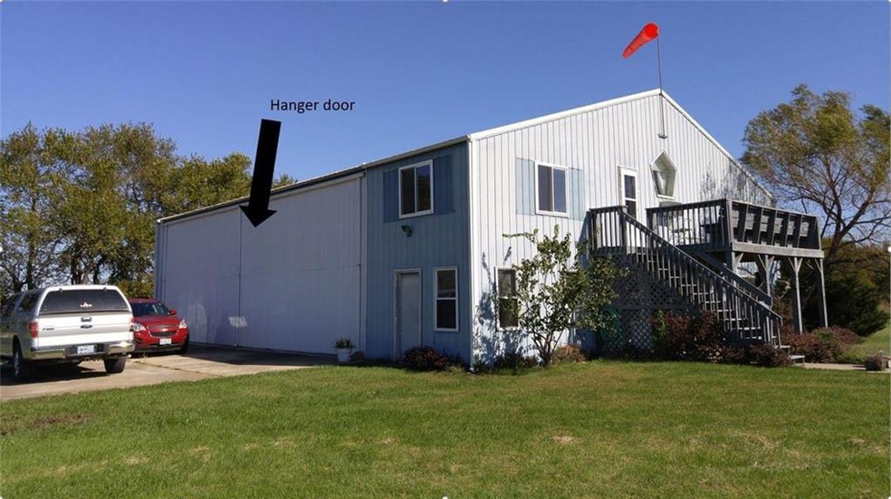 50'x60' hanger showing hanger door and apartment.