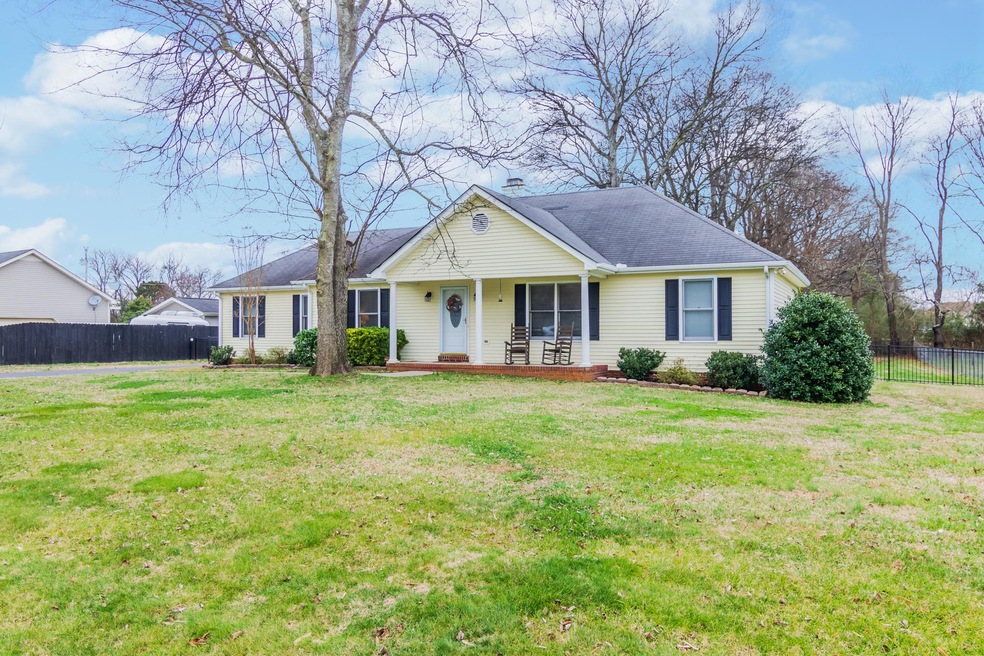 Covered Front Porch. 1/2 ac lot