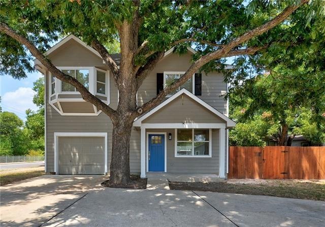 Charming East Side condo shaded by mature trees~
