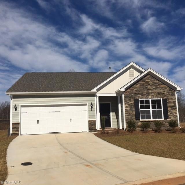 Photos are stock photos as home is being built now.  This home will have brick on the front in lieu of stone.