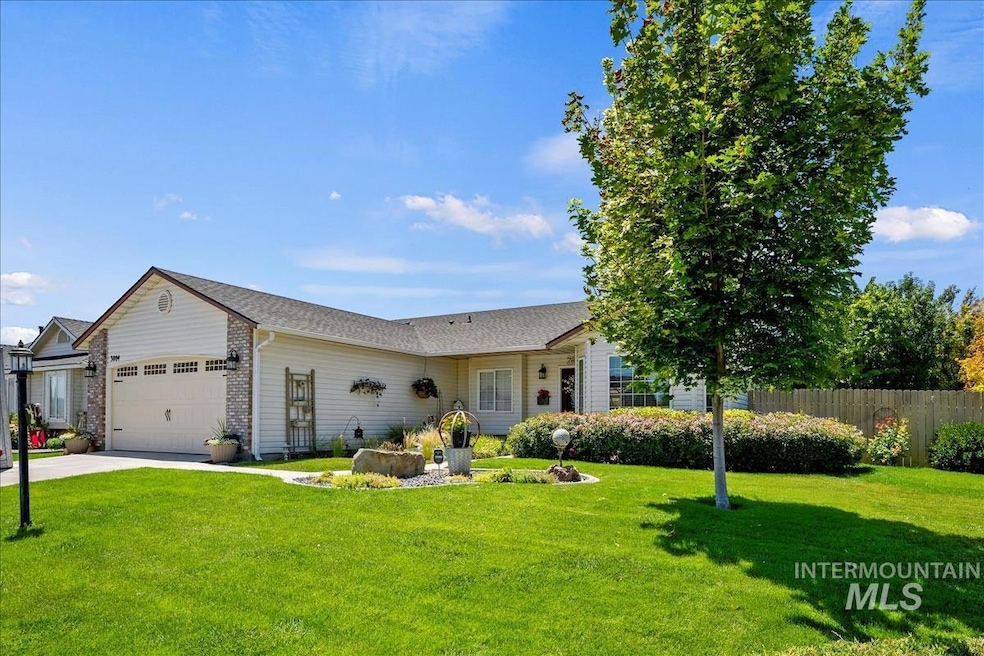 Ranch-style home with an attached garage and concrete driveway