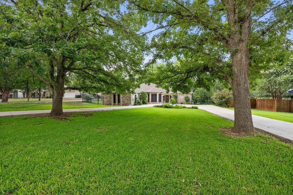 Obstructed view of property featuring concrete dr