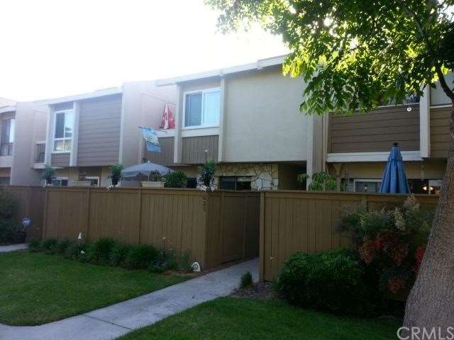 Front of House with enclosed patio