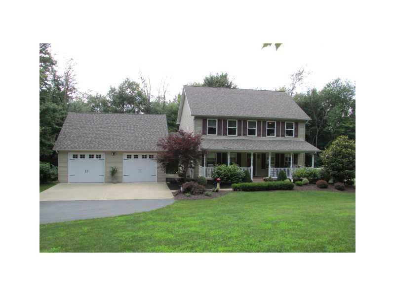 Exterior Front. Spacious home set privately on 10+