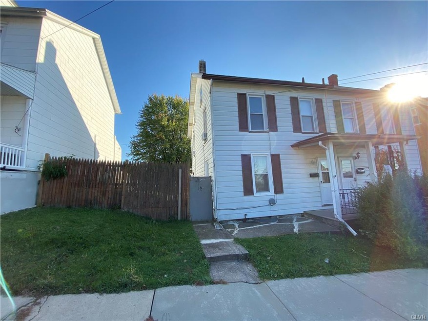 Twin home with double lot!