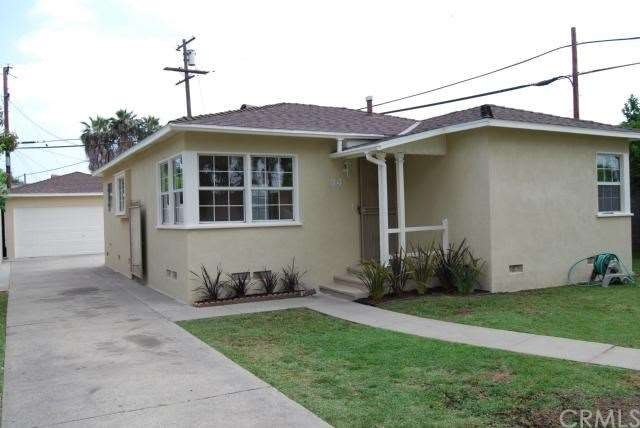 Front Home View with Long Driveway 