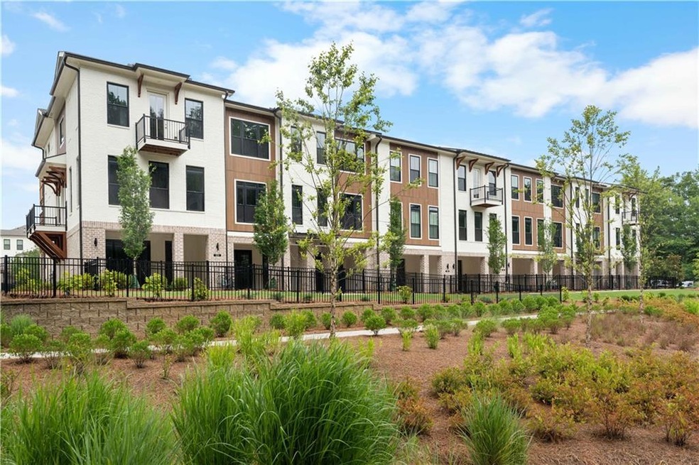 Welcome to Ecco Park and homesite 34 - Benton 3 BR Interior unit that faces the eco pond and wooded walking trail.
