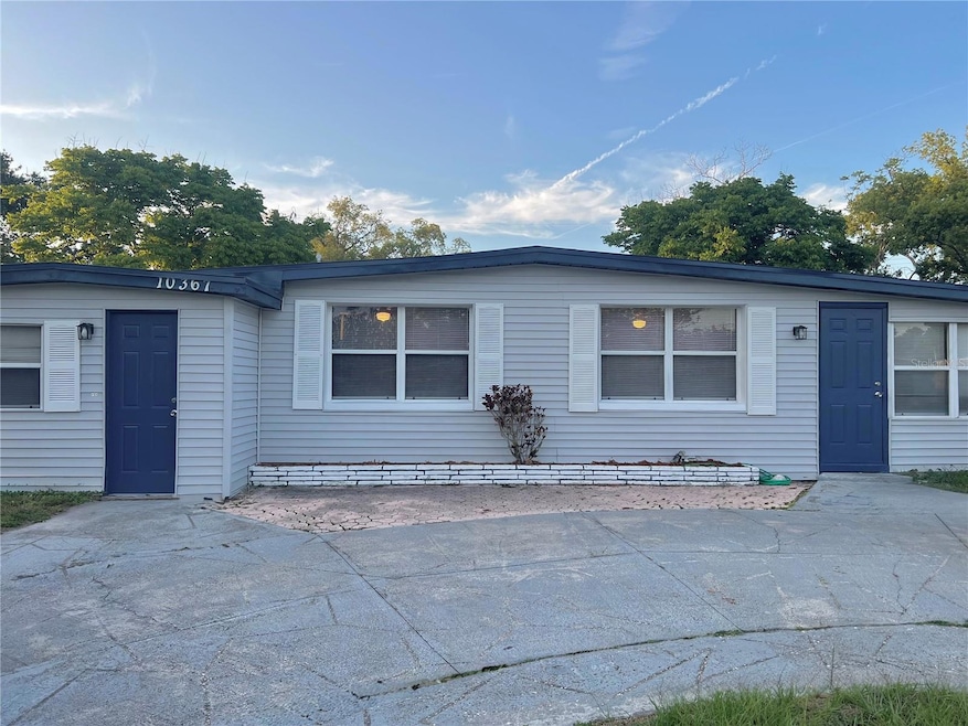 The circular driveway provides ample parking
