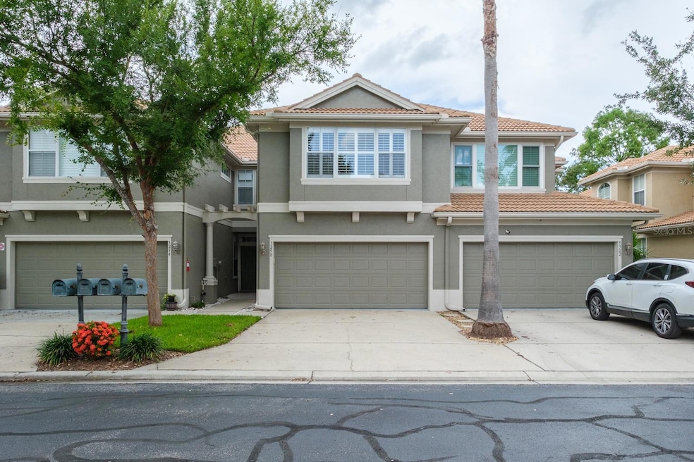 3298 Covered Bridge Dr W, Dunedin, FL 34698 - photo 1