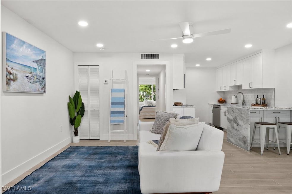 342 Harbour Dr unit 342, Naples, FL 34103 - photo 1