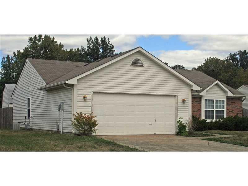 Exterior Front. One owner home with two car garage with room for work shop.