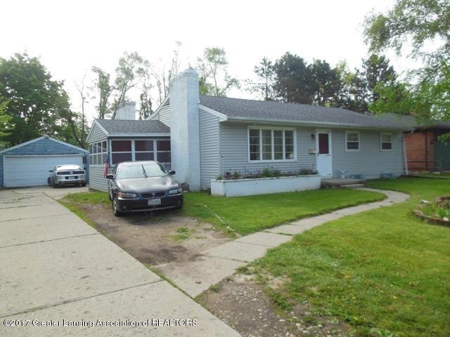 1002 N Waverly Rd, Lansing, MI 48917 - photo 1