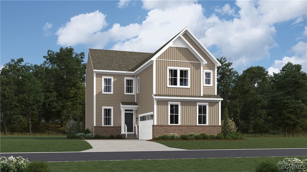 View of front of property with a garage and a fron