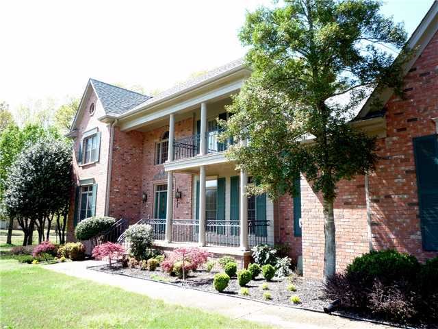 Beautiful home with covered porch and balcony and 