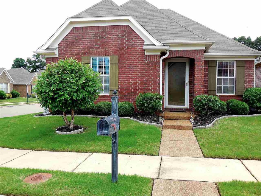 Located on a corner lot in a community just STEPS 