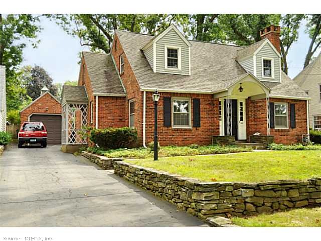 Exterior Front. Charming brick Cape Code style hom