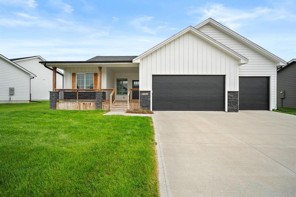 Front of Home showing Three Car Attached Garage