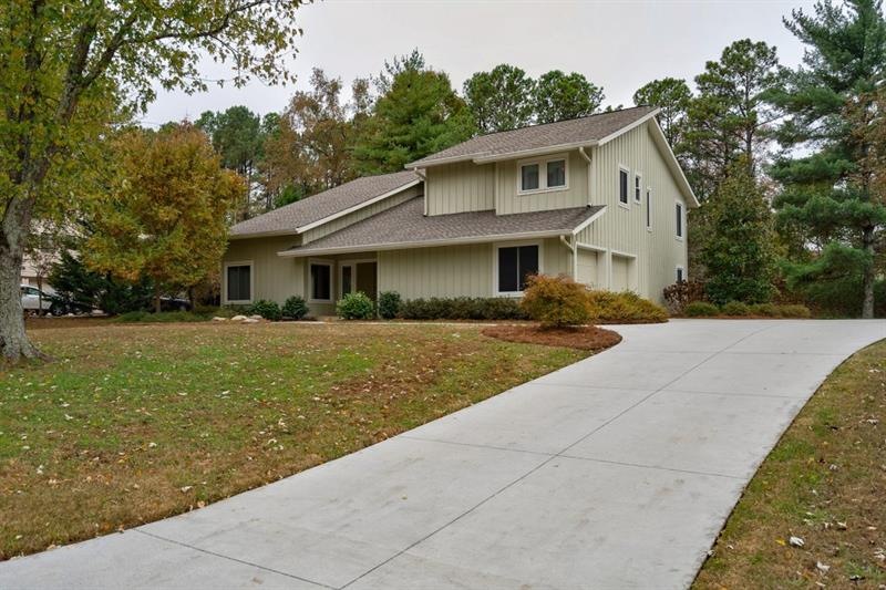 Level yard front and back and NEW driveway enterin