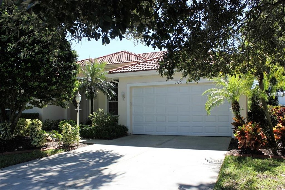 Beautiful mature landscaping frames this home.....