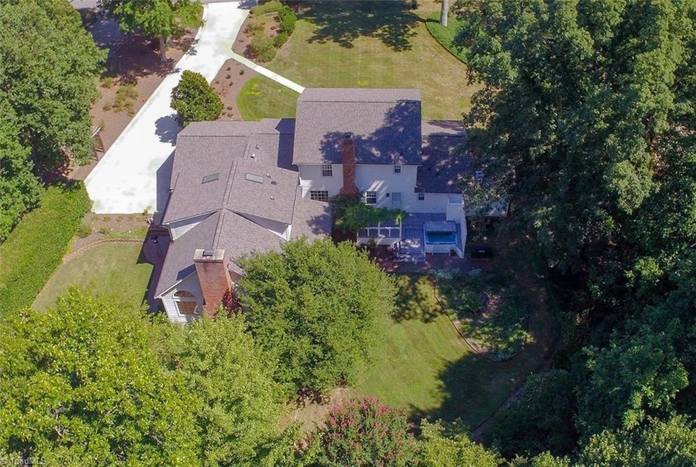 Surrounded by trees & landscaping for privacy