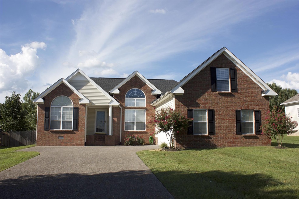 Beautiful home with side entry garage and covered porch.  Across the street from community pond and walking trail.