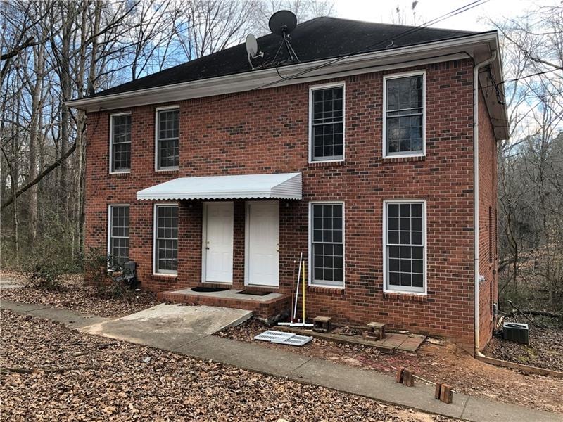 4 sided brick duplex on a full unfinished basement