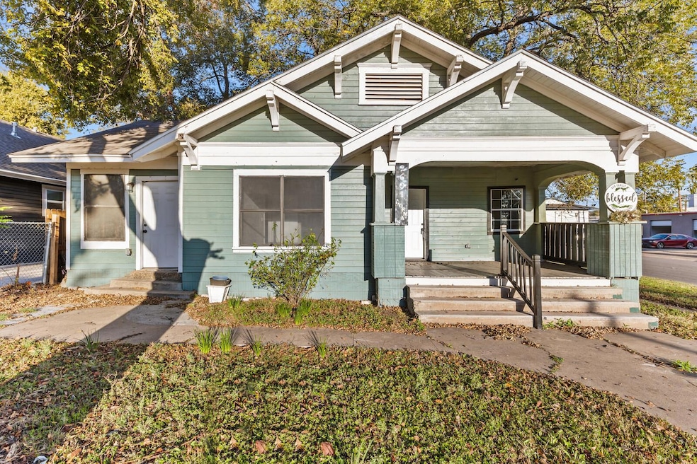 Bungalow featuring covered porch