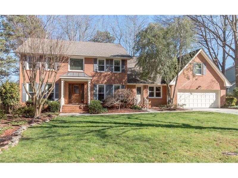 Four sided brick home on beautiful landscaped lot.