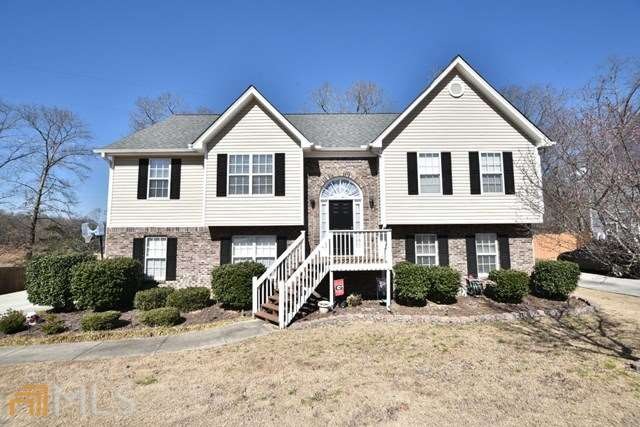 Charming 4 bedroom, 3 full bath home on large lot!