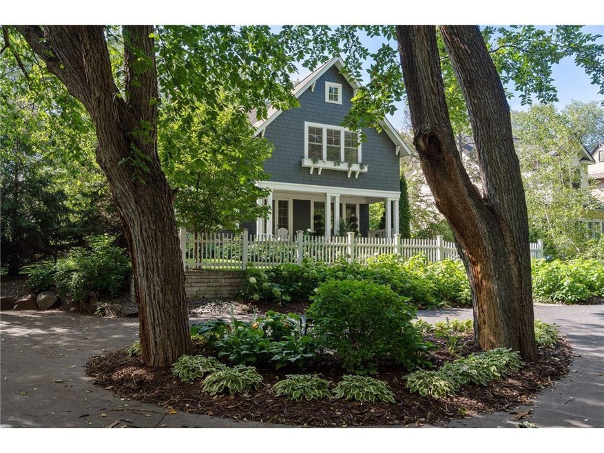 Front of home nestled in privacy at the end of cob