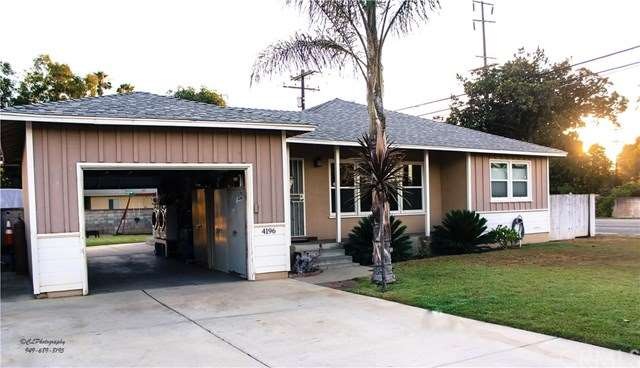Beautifully landscaped front yard with pull throug