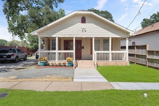 This beautiful home with a covered porch awaits yo