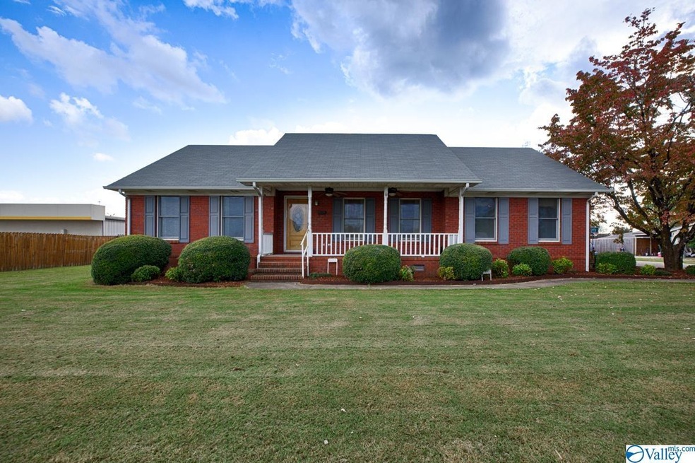 Lovely full brick rancher, nicely landscaped with 
