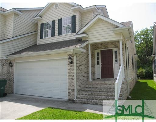 Exterior Front. View of front door and two car gar