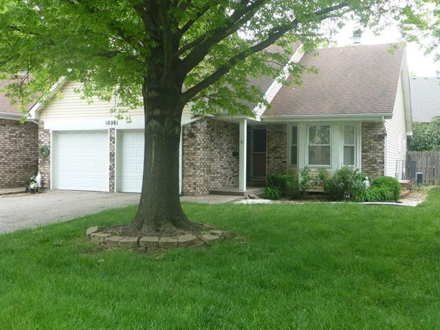 Front view-faces west with big shade tree