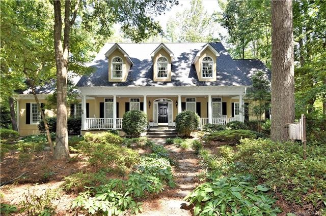 Gorgeous exterior with large covered porch, dormer