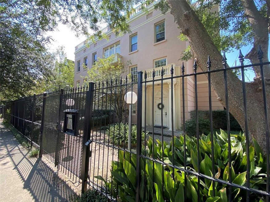 FRONT VIEW OF BUILDING OVERLOOKS ST. CHARLES AVE