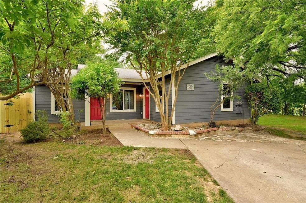 Ranch-style home featuring a porch