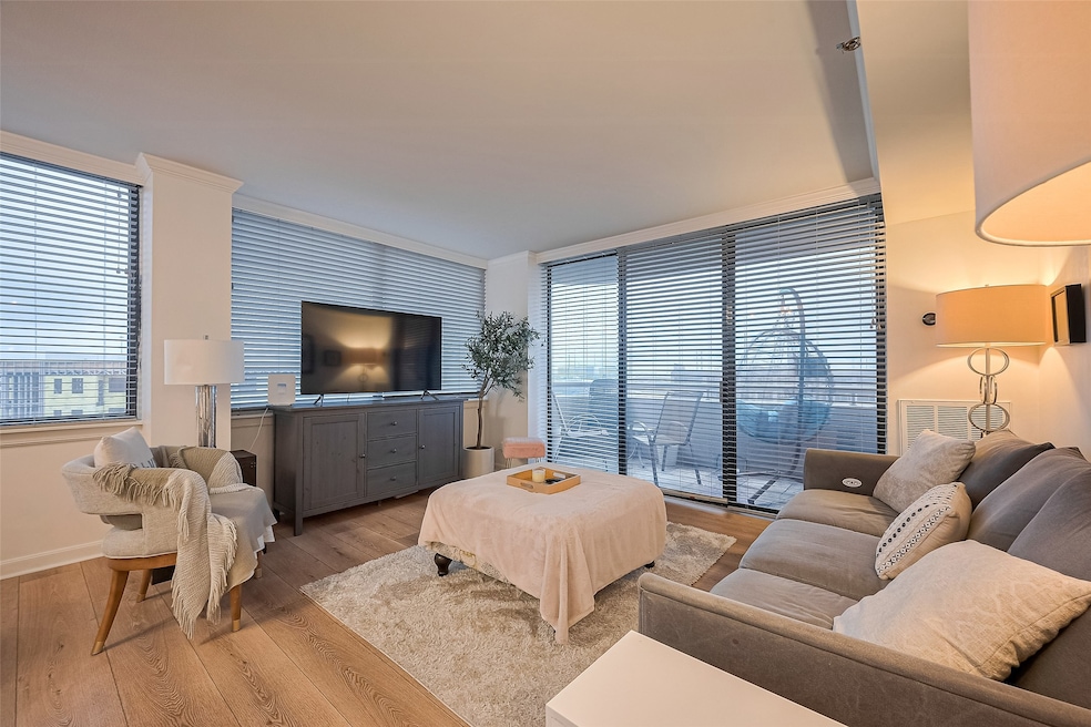 Sliding glass doors frame captivating city views a