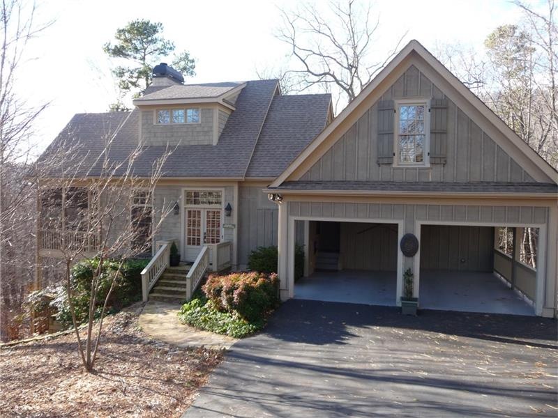 Front Exterior with carport that is mostly enclose