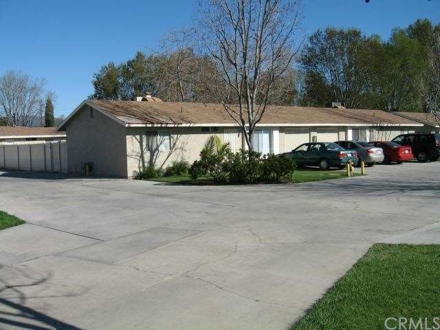 Complex photo - parking at each unit