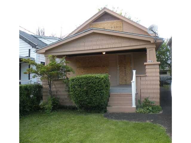 Exterior Front. Borads are only to proptect the wo