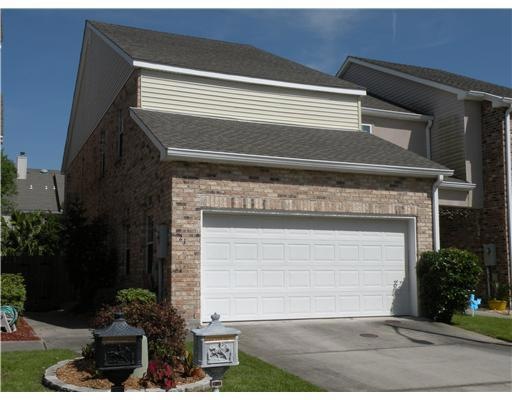 Photo. Easily maintained two-story brick townhome