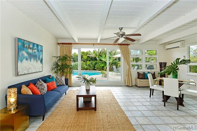 Open living area opens to sparkling pool