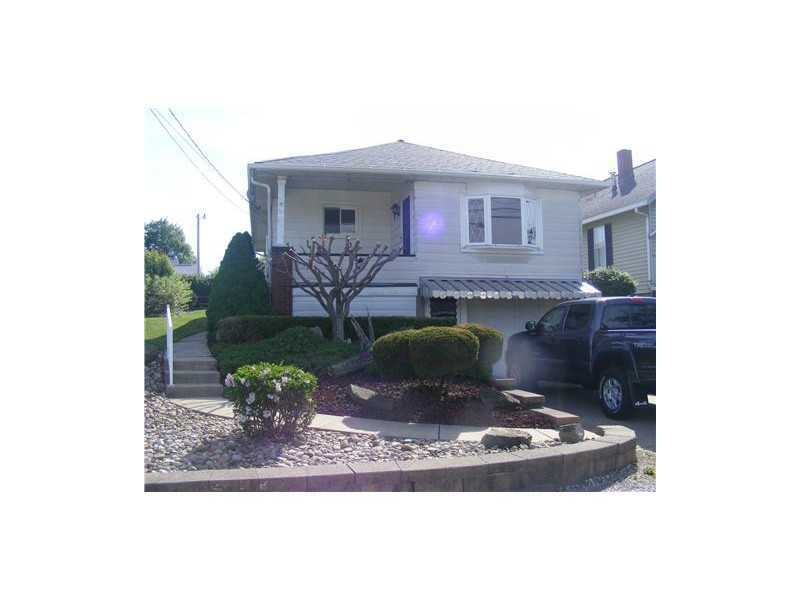 Exterior Front. Gorgeous, professional landscaping